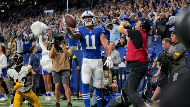 Indianapolis Colts wide receiver Michael Pittman Jr. (11) celebrates after scoring a touchdown Monday, Nov. 28, 2022, during a game against the Pittsburgh Steelers at Lucas Oil Stadium in Indianapolis.  